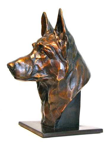Portrait sculkpture of a german shepherd dog entitled 'ACHTUNG' (bronze edition)